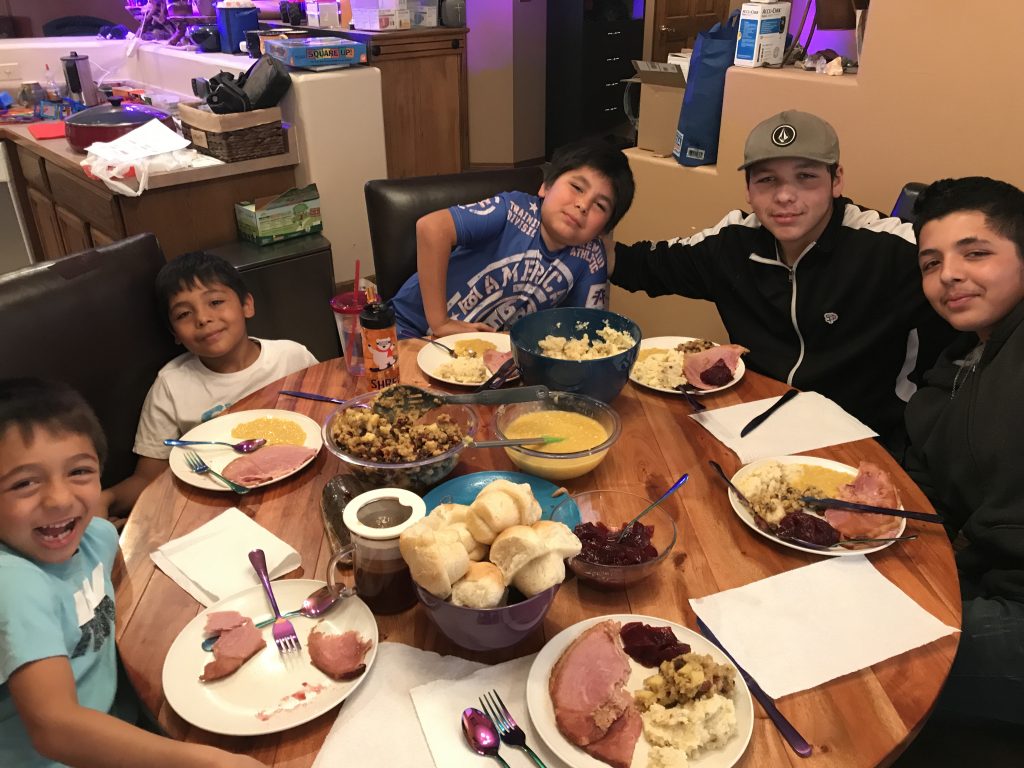 Making a house into a home (Photo Courtesy of Susan Bauer) From left, Zayden (7), Taven (10), Romeo (12), Chris (18) and Carlos (17).