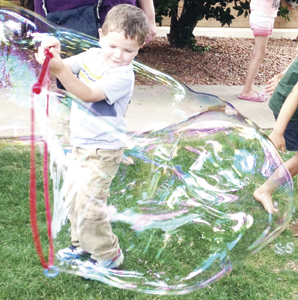 Reading program wraps with books, bubbles